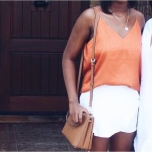 Orange Sleeveless V-Neck Top & White Mini Skort Outfit